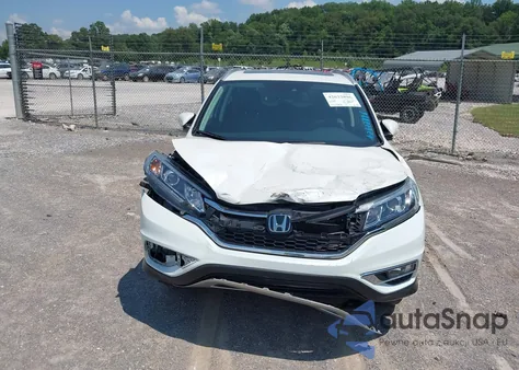 2016 Honda Cr-V Touring z USA, uszkodzony, nr VIN 5J6RM4H95GL118070